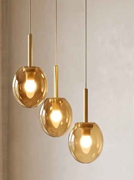 MOYA pendant trio with amber glass shades